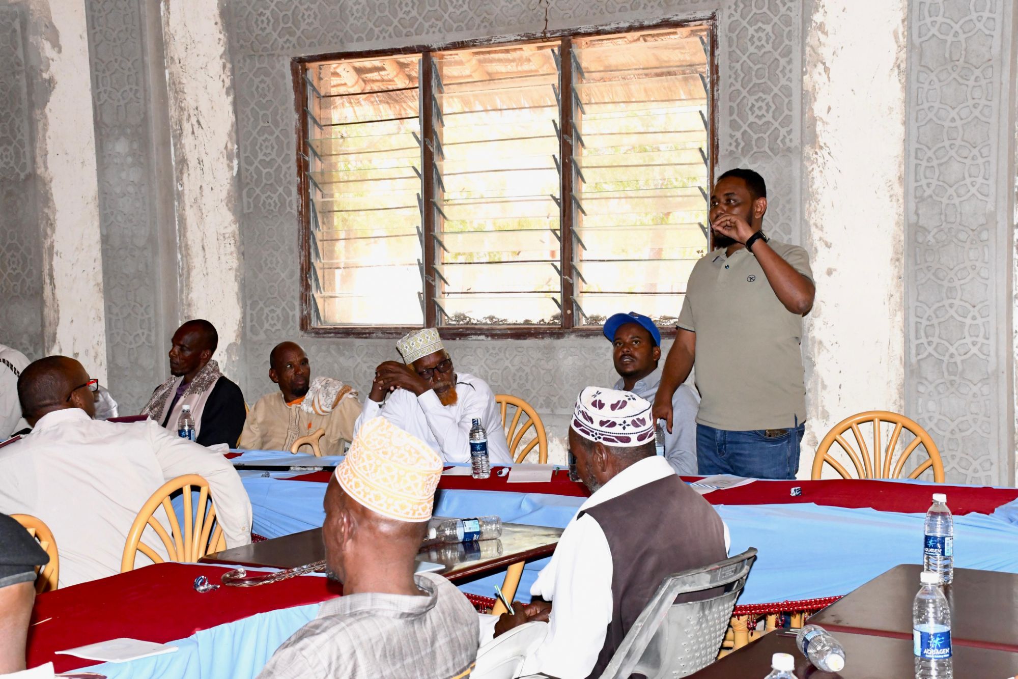 Mr. Roba Hussein Cherab Sub-County Admin addressing participants at the meeting
